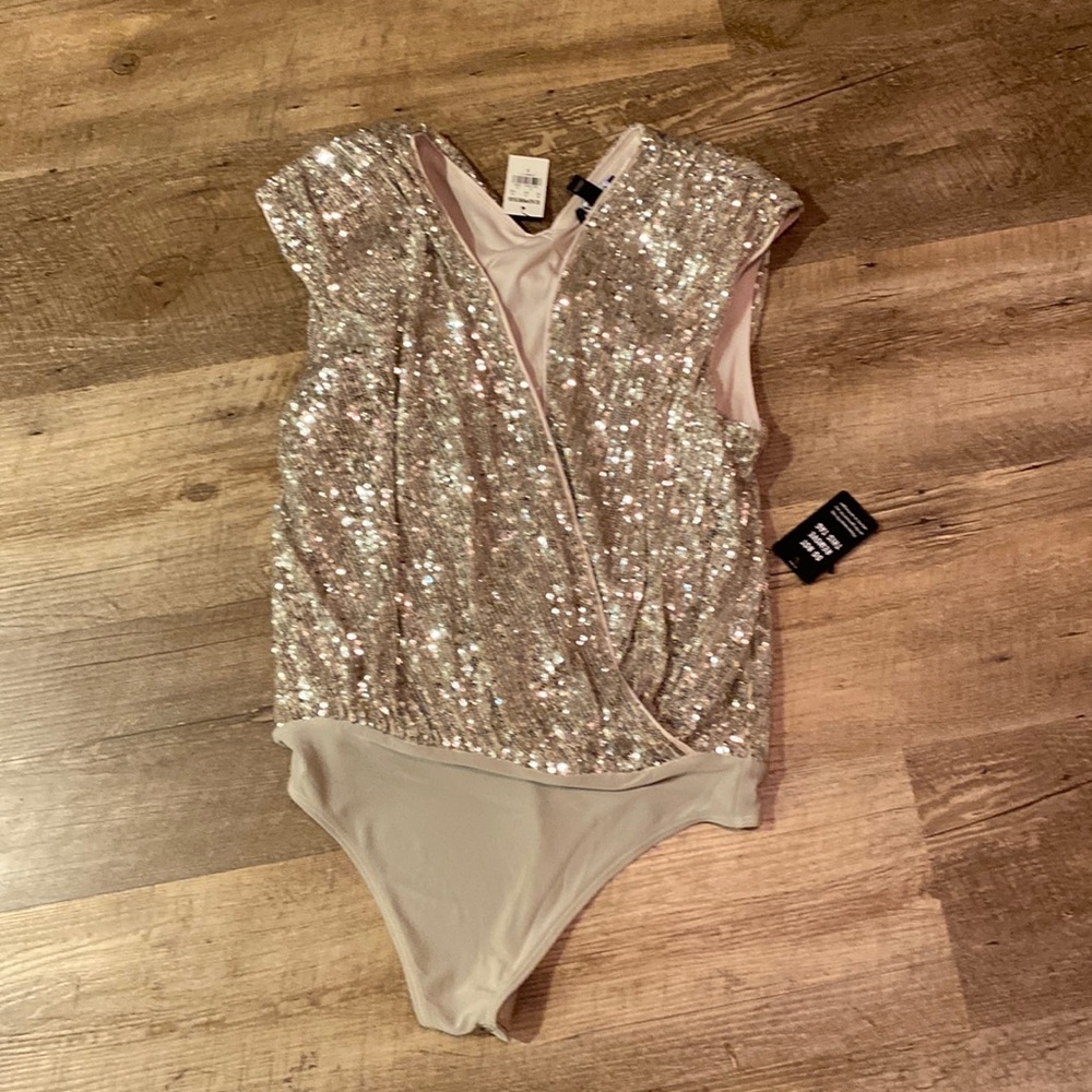Small Sequin bodysuit shirt.